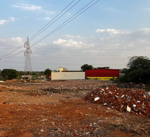 Highway Facing Commercial Site Near Industrial Warehouses