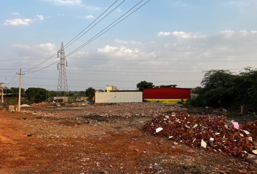 Highway Facing Commercial Site Near Industrial Warehouses